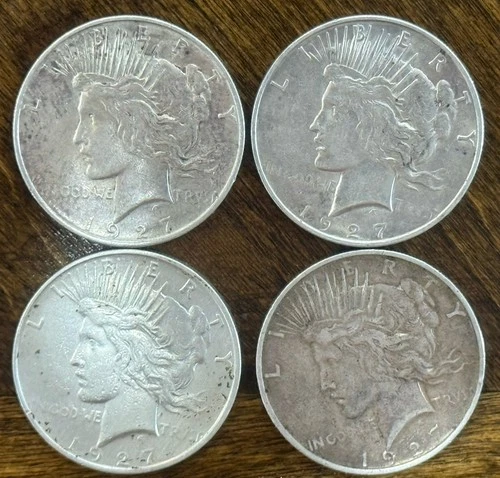 Lot of #4  1927-D Peace Dollars. Winner gets all four.