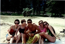 1990s Group Of Friends Relaxing On Beach Smiling Tropical Vintage Photo