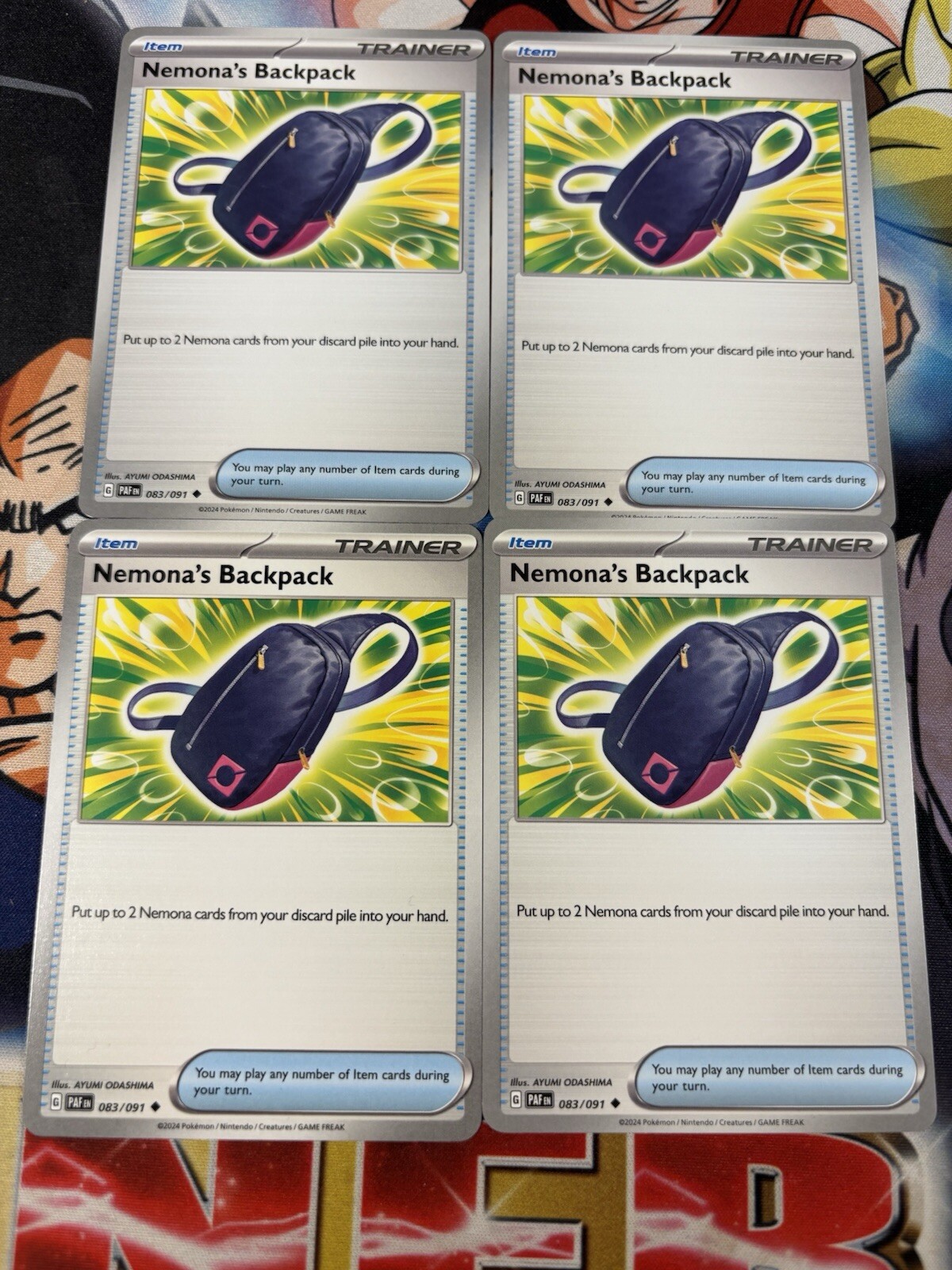 4x Nemona's Backpack 083/091 Pokémon TCG Paldean Fates NM Playset