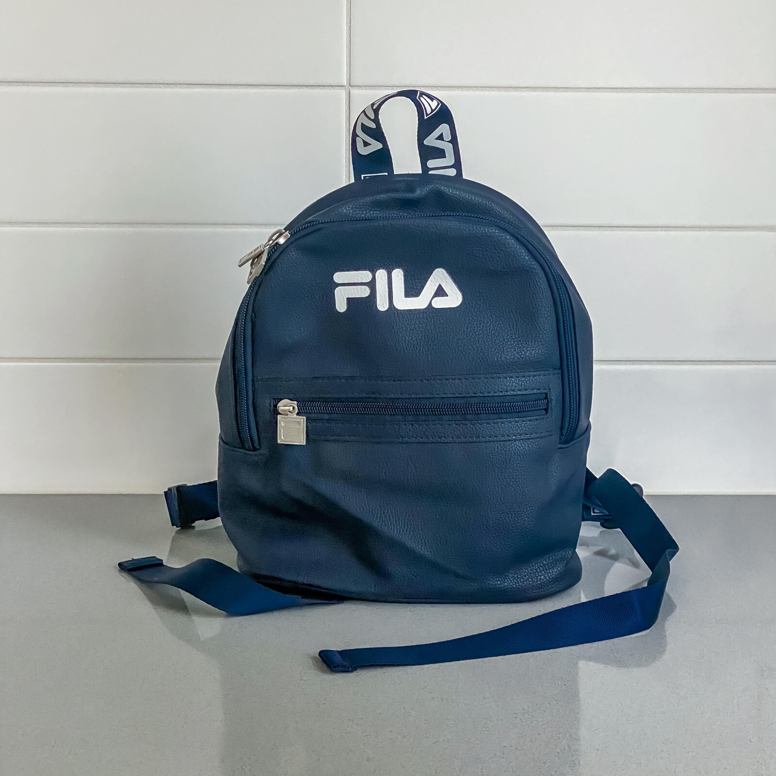 FILA Mini Backpack Adjustable Strap Navy Blue Whi… - image 1