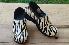 Dansko 38 Approximately 7.5-8 In Women's Zebra Pattern Gently Used Clogs