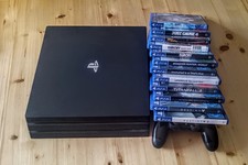 Sony PlayStation 4 Pro 1TB Spielkonsole - Schwarz incl. Spielepaket