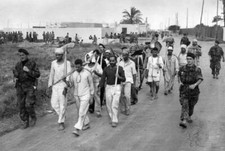 The Suez crisis - Egyptian prisoners war are marched out to work P- Old Photo