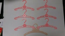 VINTAGE CHILDREN'S PLASTIC CLOTHES HANGERS, SET OF 7
