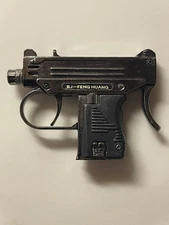vintage BJ-Feng Huang Uzi pistol-shaped cigarette lighter