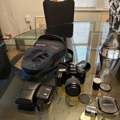 Canon EOS Rebel 35mm SLR Film Camera With 35-80mm Lense, Flash, Bag Accessories