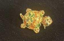 multi colored turtle brooch crafted from gold tone alloy embellished rhinestones