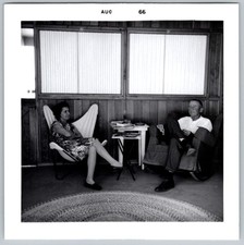 Vtg B&W Snapshot Couple Relaxing Chairs Cabin Interior August 1966 Aug 66 Photo