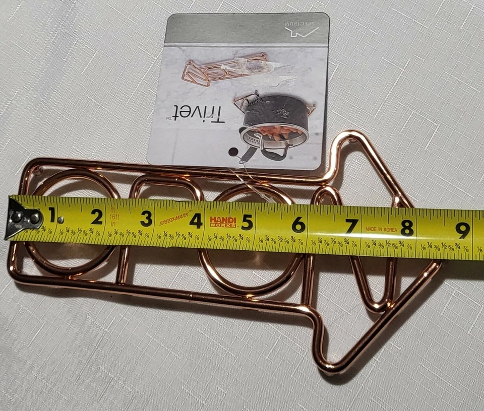 SPECTRUM "OPEN" TRIVET BRASS TONE METAL CUT OUT 8.5" LONG NEW WITH TAG - Image 3 of 4