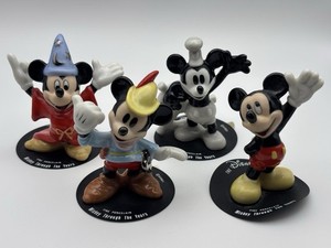 Set Of 4 Disney Store Mickey Mouse Through The Years Fine Porcelain Figurines