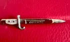 WW1 sweetheart 'bayonet' brooch with mother of pearl grip, engraved 'OSTENDE'