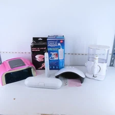 AS-IS BEAUTY & ORAL CARE BUNDLE: FLOSSERS, TOOTHBRUSH, NAIL KITS, REMOVER