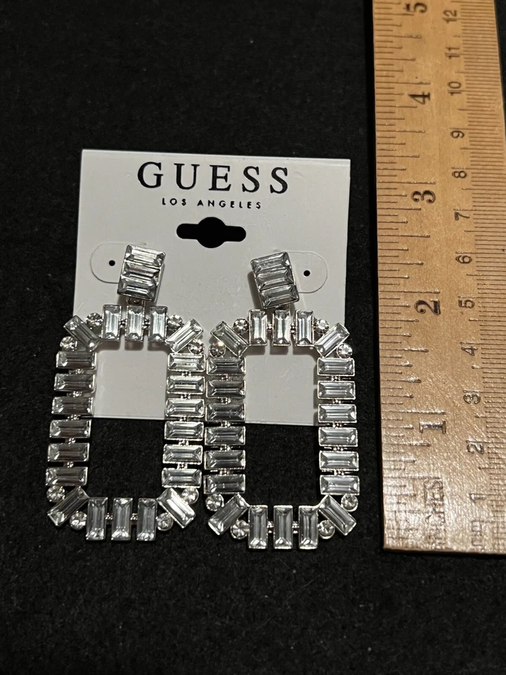 NEW GUESS SILVER TONE "O" SHAPED CRYSTALS BAGUTTE EARRINGS 2.3x1.3 MSRP $25 - Image 2 of 4