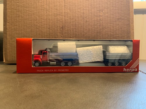 Camión de volteo HERPA #6273 GMC de 10 ruedas con remolque de volteo de tres ejes 1:87 | Zustand: New