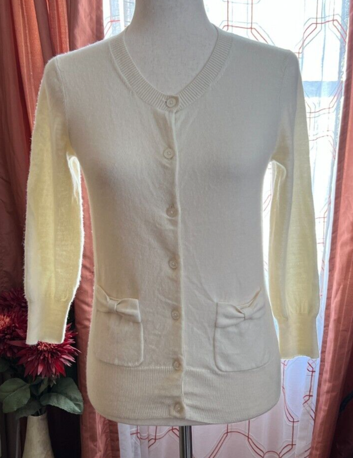 Juicy Couture women's ivory cream merino wool cardigan sweater bow