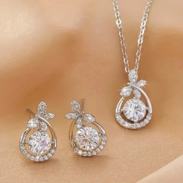 Juego de pendientes colgantes VVS1 moissanita de 3 quilates corte redondo para mujer enchapados en oro blanco de 14 quilates Foto 4 de 4