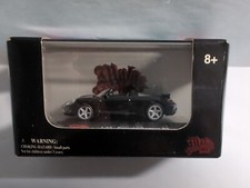 Malibu International Black Convertible Porsche Carrera GT 1:87 Scale NEW