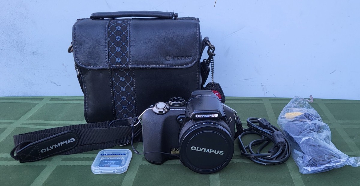 Olympus SP-560UZ 8MP Digital Camera with Dual Image Stabilized 18x
