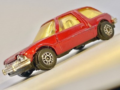 Corgi Juniors 1975 AMC Pacer - Amber Windows -1/64-