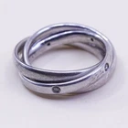 Size 4.5, vintage Sterling silver entwined band with round Cz, 925 ring