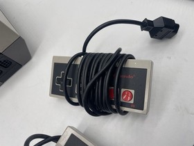 Nintendo NES console 2 Controllers And 1 Game - No Cables. UNTESTED