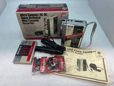 GE Ultra Compact Voice Activated Mini Cassette recorder with tape  accessories