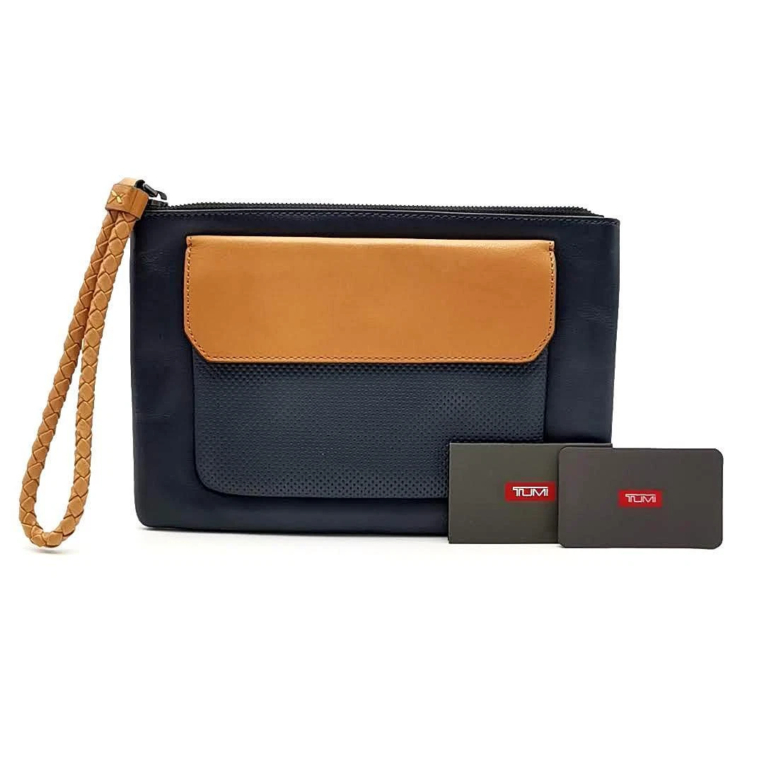Tumi clutch shop wallet