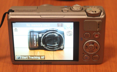Canon PowerShot S100 12.1MP Digital Camera - Silver FOR PARTS AND