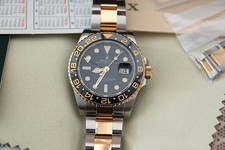 ROLEX GMT Master II - 116713LN - 2006 - Steel & Gold - Papers- Rolex Warranty