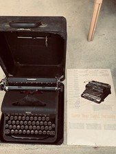 1930s royal arrow portable typewriter, case with key, original pamphlets thumbnail