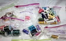 50 SPOOLS OF ASSORTED EMBROIDERY THREAD