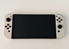 New ListingUsed Nintendo Switch Oled Model With Neon White Joy-Cons & Cables