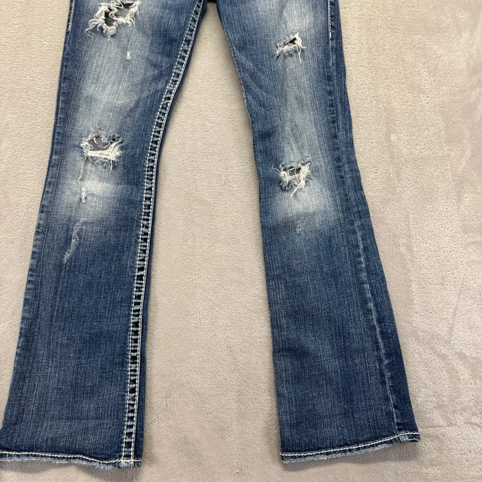 Pantalones de mezclilla plateados para mujer 27 Tuesday corte bota desgastados bigotes lavado medio Foto 3 de 4