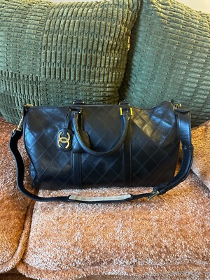 Authentic Chanel Black Quilted Lambskin Boston Duffle Bag with