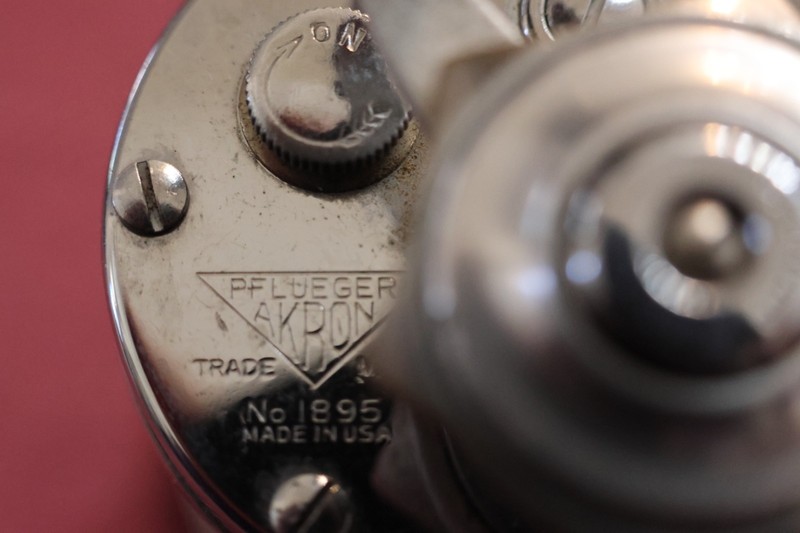 Fishing Reel spinning PFLUEGER AKRON,# 1895,USA.3"Liked the clicking sound