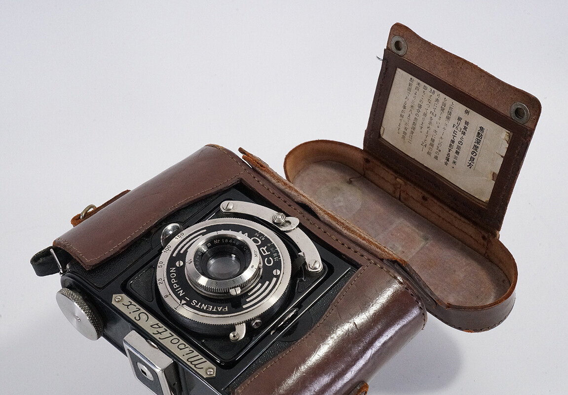 カメラ型貯金箱 MinoltaXD 実物大 ノベルティ MOLTA MINOLTA SIX, WITH CASE (STRAP TORN/LENS CLOUDY)/222785