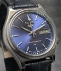 vintage seiko 5 automatic day date movemvent no. 7019A japan made men's watch.