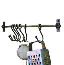 Curved iron kitchen rail with six sliding storage hooks for pans and utensils
