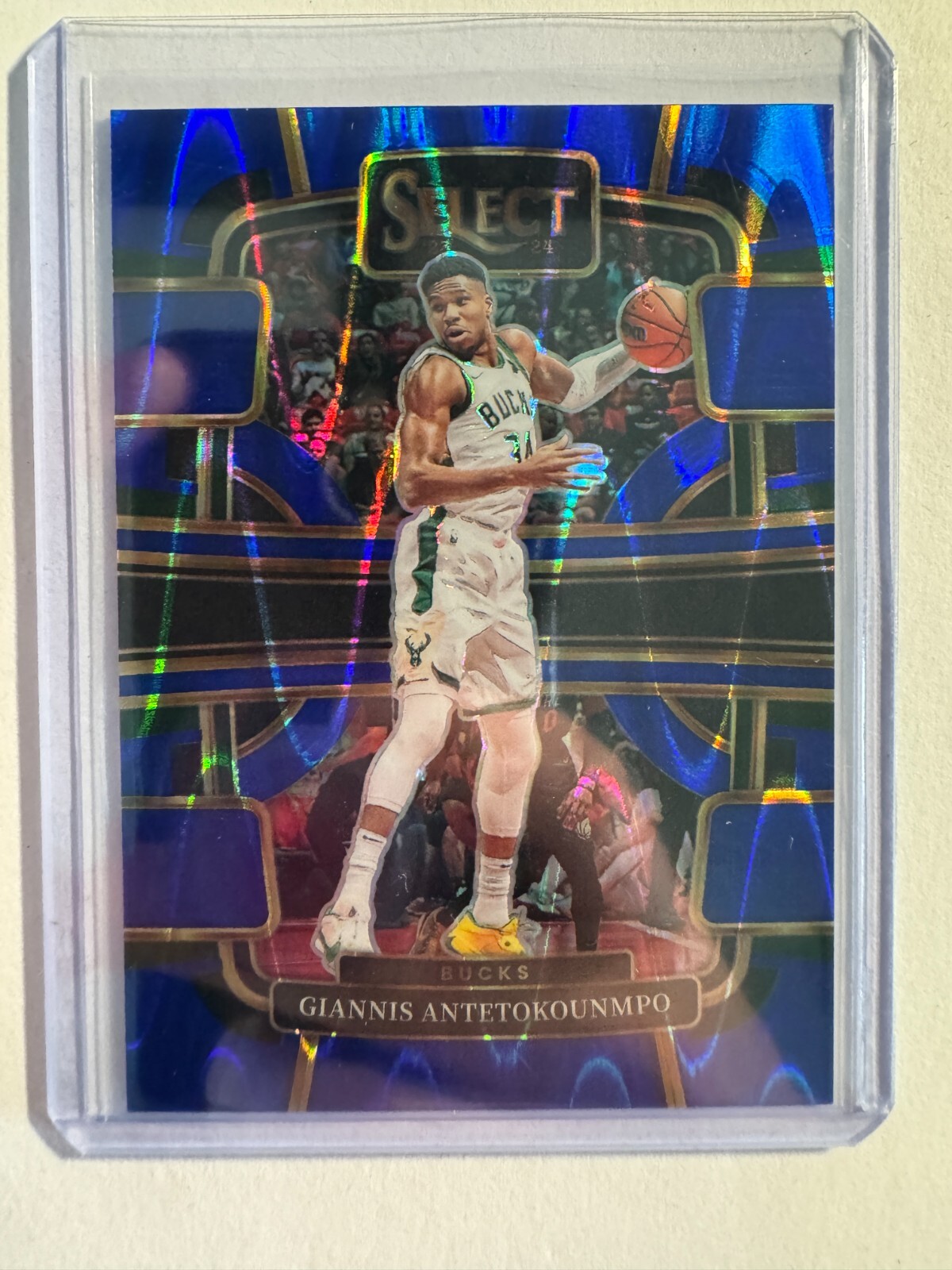 K234,412 - 2023-24 Select Prizms Blue Tectonic #60 Giannis Antetokounmpo #/99