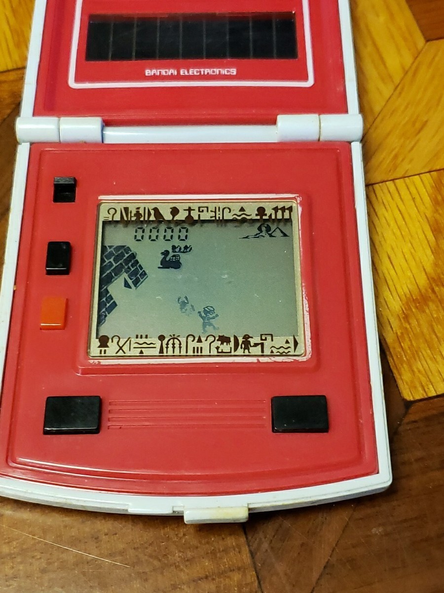 Vintage Invaders of the Mummy's Tomb Bandai LCD Game Solar Power