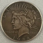 Key-date XF-AU 1928 Silver Peace Dollar.