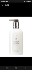 Molton Brown London Unisex 10Oz Flora Luminare Hand Lotion Women's