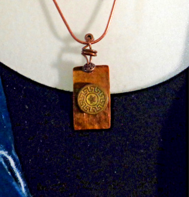 Artisan crafted 1 ¼ x 5/8  hammered copper pendant with antique button on 19 ''