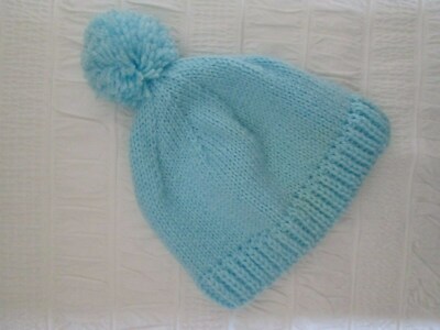 pale blue bobble hat