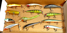 12 ASS0RTED FISHING LURES - 1 HEDDON, 1 CORDELL, 1 LONG A , 2 STORM & 7 NO NAME