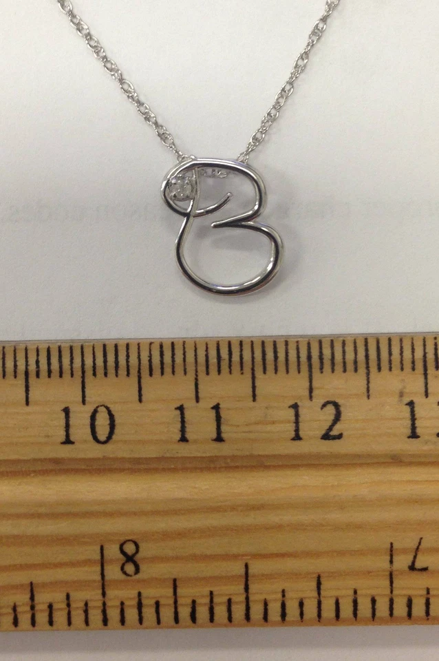 Colgante inicial diamante oro blanco 10K Foto 3 de 4