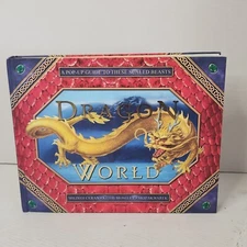 DRAGON WORLD Pop-Up Guide Scaled Beasts Ceran Moseley Skwarek HC GOOD READ