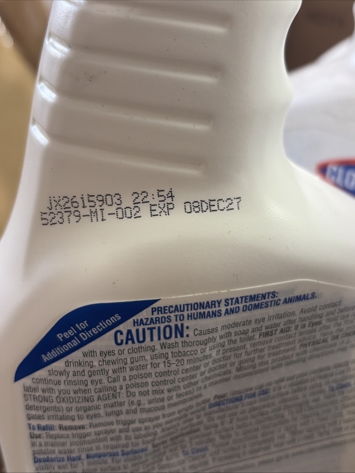 White 32 oz Clorox Healthcare Bleach bottle with blue trigger and black text containing safety precautions and product code.