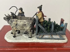Lang and Wise Folk Art Village The Joy Of Christmas 2 Oxen Pulling Sled W/ Tree