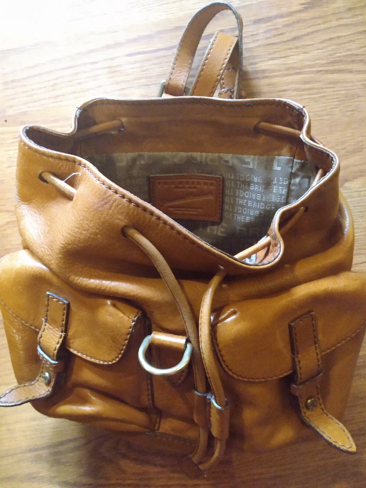 THE BRIDGE handcrafted tan leather backpack brass hardware adjustable straps — image 7
